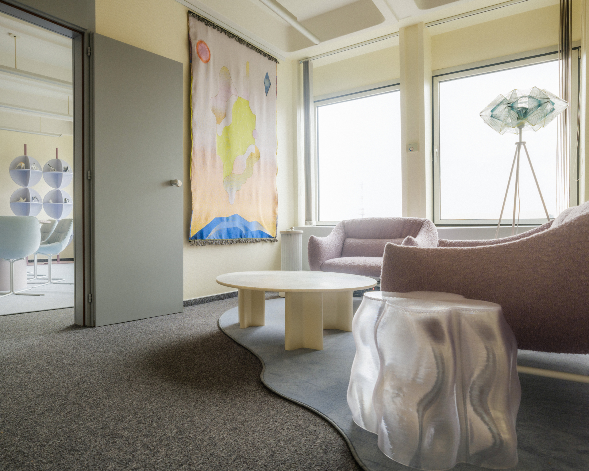 furniture, tapestries and ornaments arranginc cosy office rlaxation space