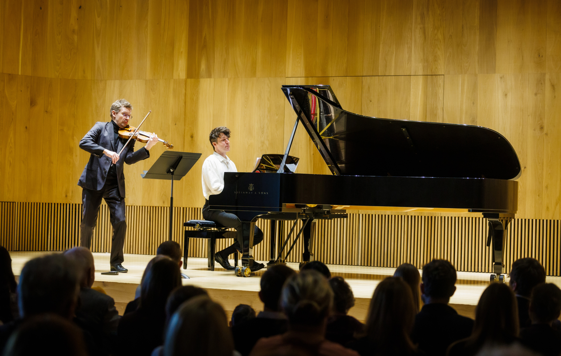 violinist and pianist on stage