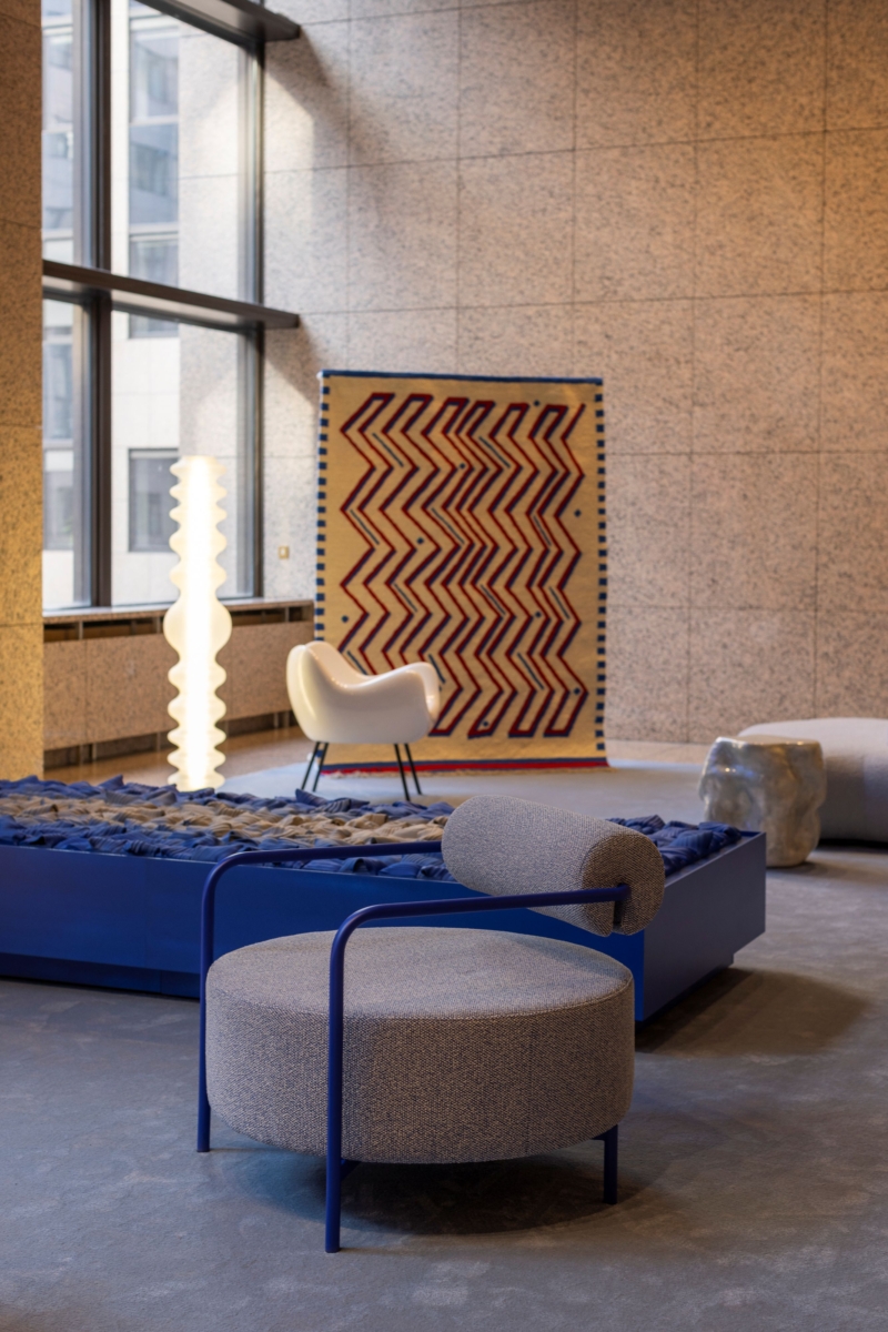 a hall decorated with specifically designed pieces of furniture