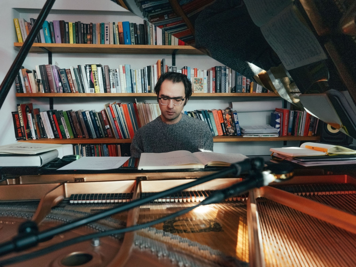 composer Debicz at his piano durink work
